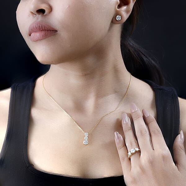 120 Facet Moissanite (Rnd 6.5mm) Trilogy Ring Pendant Without Chain And Stud Earrings Jewelry Set For Women In Vermeil YG Over Sterling Silver 6.20 Ctw