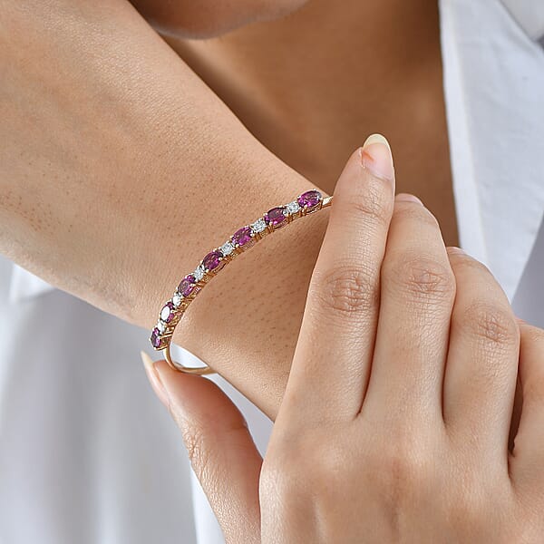 AAA Radiant Ember Garnet And Luxuriant Lab Grown Diamond E-F VS 4.40 Ctw Cuff Bracelet In 10K Yellow Gold (7.25 In)