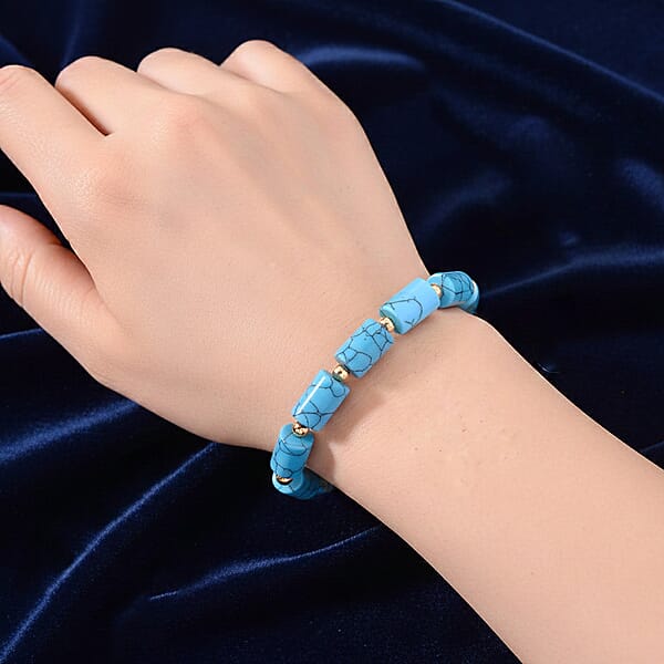 Blue Howlite Barrel Bracelet In Goldtone 93.65 Ctw (7-9 Inches)