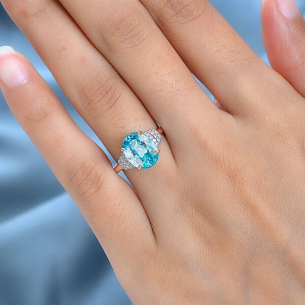 Cambodian Blue Zircon And Diamond 5.60 Ctw Ring In 18K Vermeil Rose Gold Over Sterling Silver (Del. In 10-12 Days)