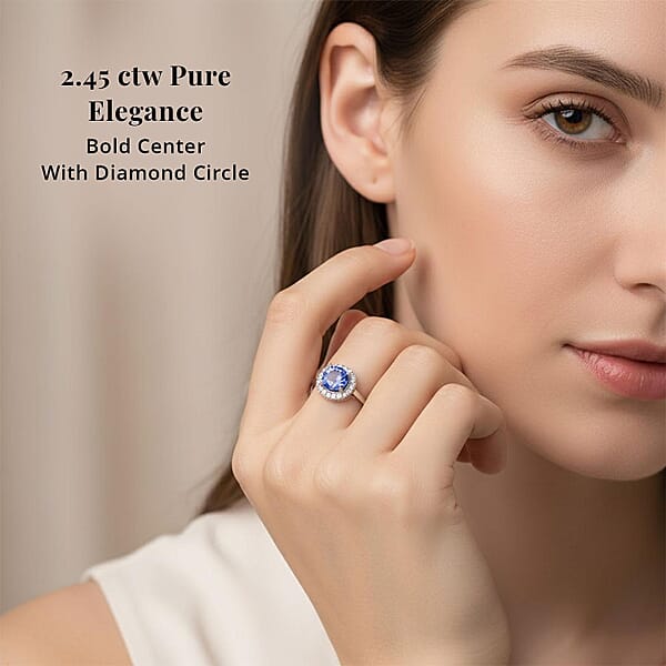 Certified And Appraised Rhapsody 950 Platinum AAAA Tanzanite And E-F VS Diamond Halo Ring 5.25 Grams 2.45 Ctw