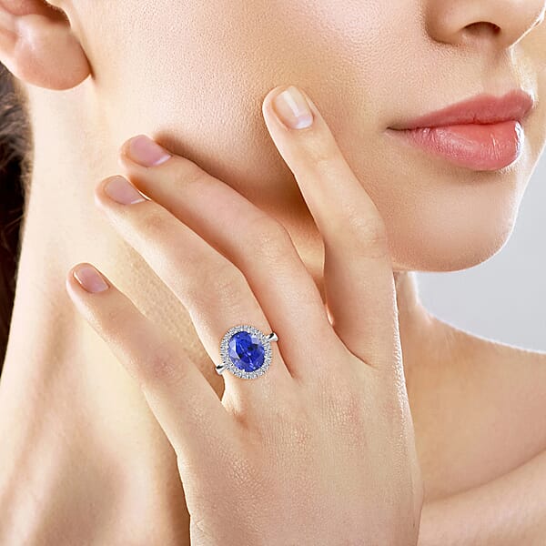 Certified & Appraised Rhapsody 950 Platinum AAAA Tanzanite And E-F VS Diamond Halo Ring 8 Grams 6.40 Ctw
