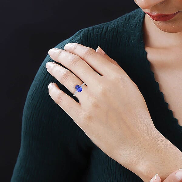 Certified & Appraised Rhapsody 950 Platinum AAAA Tanzanite Diamond (E-F VS) (0.15 Cts) Ring 2.25 Ctw