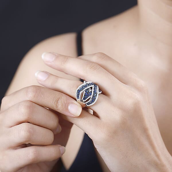 Ceylon Blue Sapphire And Moissanite 3.85 Ctw Overbridge By-pass Ring In Rhodium Over Sterling Silver (Size 6.0)