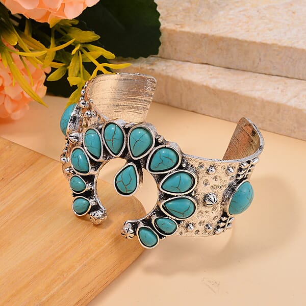 Constituted Blue Howlite 5.00 Ctw Squash Blossom Cuff Bracelet In Silvertone (7.50 In)
