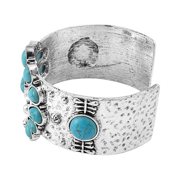 Constituted Blue Howlite 5.00 Ctw Squash Blossom Cuff Bracelet In Silvertone (7.50 In)