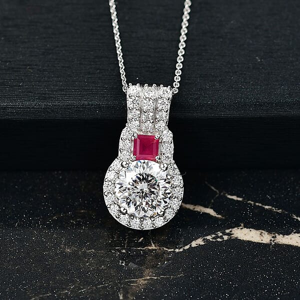 D'Joy 120 Facet Moissanite And Niassa Ruby (FF) 3.80 Ctw Pendant Necklace In Rhodium Over Sterling Silver 20 Inches