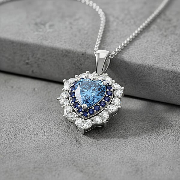 D'Joy Blue And White Moissanite And Blue Sapphire 3.00 Ctw Crowned Heart Glow Pendant Necklace In Rhodium Over Sterling Silver 18 Inches