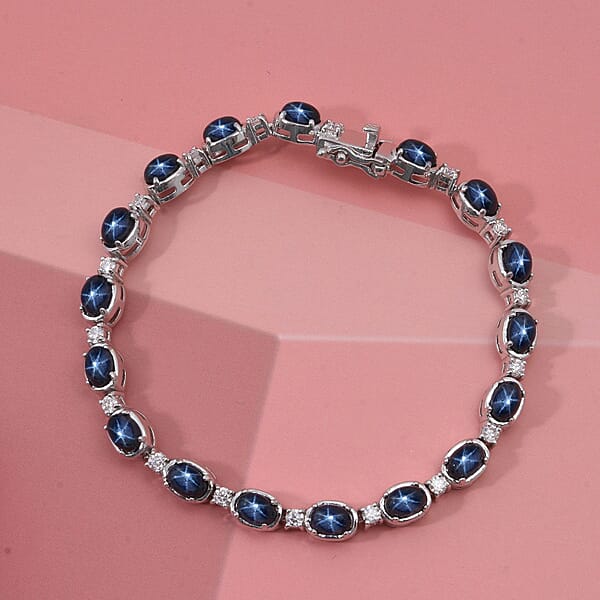 D'Joy Blue Star Sapphire (DF) And Moissanite 12.15 Ctw Eternal Starlace Bracelet In Rhodium Over Sterling Silver (6.50 In)