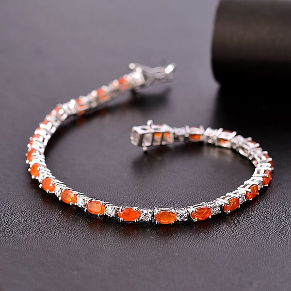 D'Joy Crimson Fire Opal And Moissanite 5.00 Ctw Fiery Tennis Bracelet In Rhodium Over Sterling Silver (7.25 In)