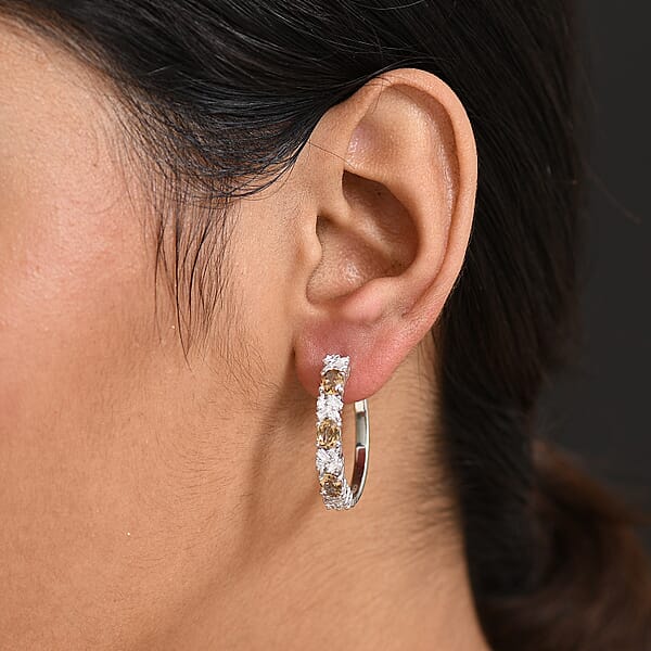 D'Joy Golden Turkizite And Moissanite 3.30 Ctw Earrings In Rhodium Over Sterling Silver