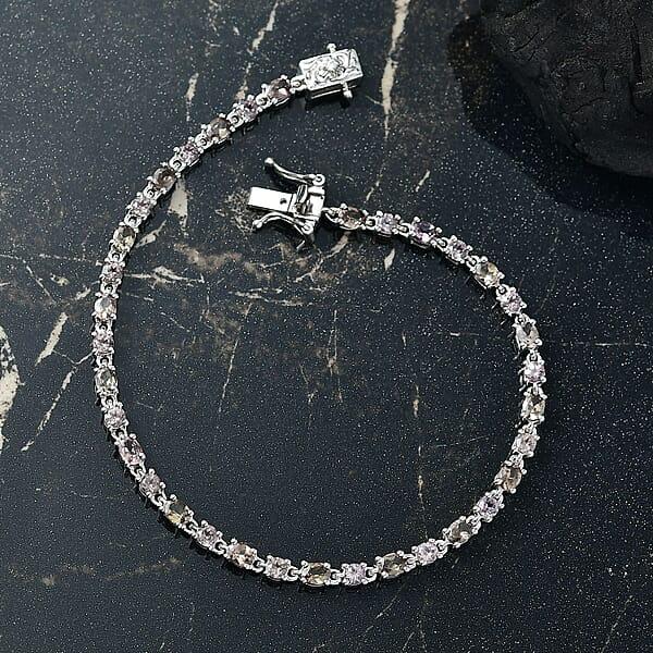 D’Joy Madagascar Color Change Garnet And Moissanite 5.80 Ctw Classic Tennis Bracelet In Rhodium Over Sterling Silver (6.50 In)