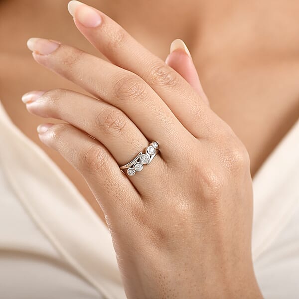 D'Joy Moissanite 0.50 Ctw Bypass Ring In Platinum Over Sterling Silver