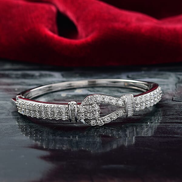 D'Joy Moissanite 5.90 Ctw Loop Knot Bangle Bracelet In Rhodium Over Sterling Silver (8.00 In)