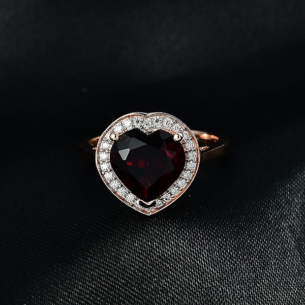 D'Joy Mozambique Garnet And Moissanite 3.90 Ctw Heartfire Glow Ring In 18K Vermeil Rose Gold Over Sterling Silver