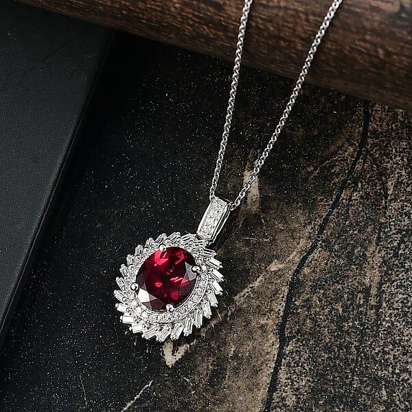 D'Joy Orissa Rhodolite Garnet Moissanite Starburst Pendant Necklace In Rhodium Over Sterling Silver 11.10 Ctw (20 Inches)