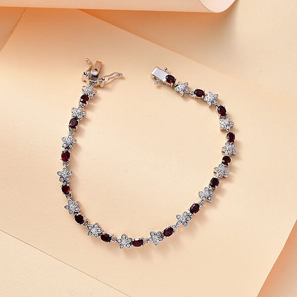 D'Joy Premium Anthill Garnet And Moissanite 5.30 Ctw Flower Bracelet In Rhodium Over Sterling Silver (7.25 In)