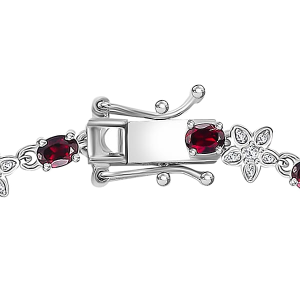 D'Joy Premium Anthill Garnet And Moissanite 6.00 Ctw Flower Bracelet In Rhodium Over Sterling Silver (8.00 In)