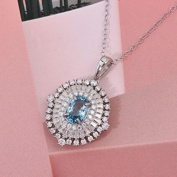 D'Joy Premium Cambodian Blue Zircon And Moissanite 3.50 Ctw Regal Halo Pendant Necklace In Rhodium Over Sterling Silver 20 Inches
