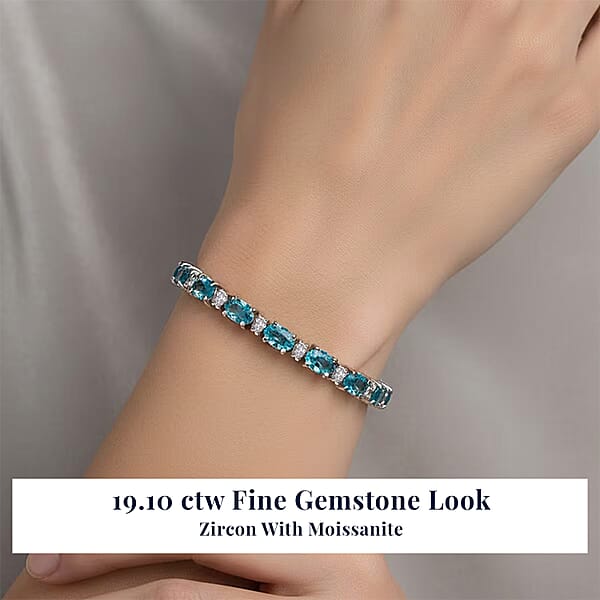 D'Joy Premium Cambodian Blue Zircon And Moissanite 19.10 Ctw Ocean Glow Bracelet In Rhodium Over Sterling Silve (7.25 In) (Del. In 10-12 Days)