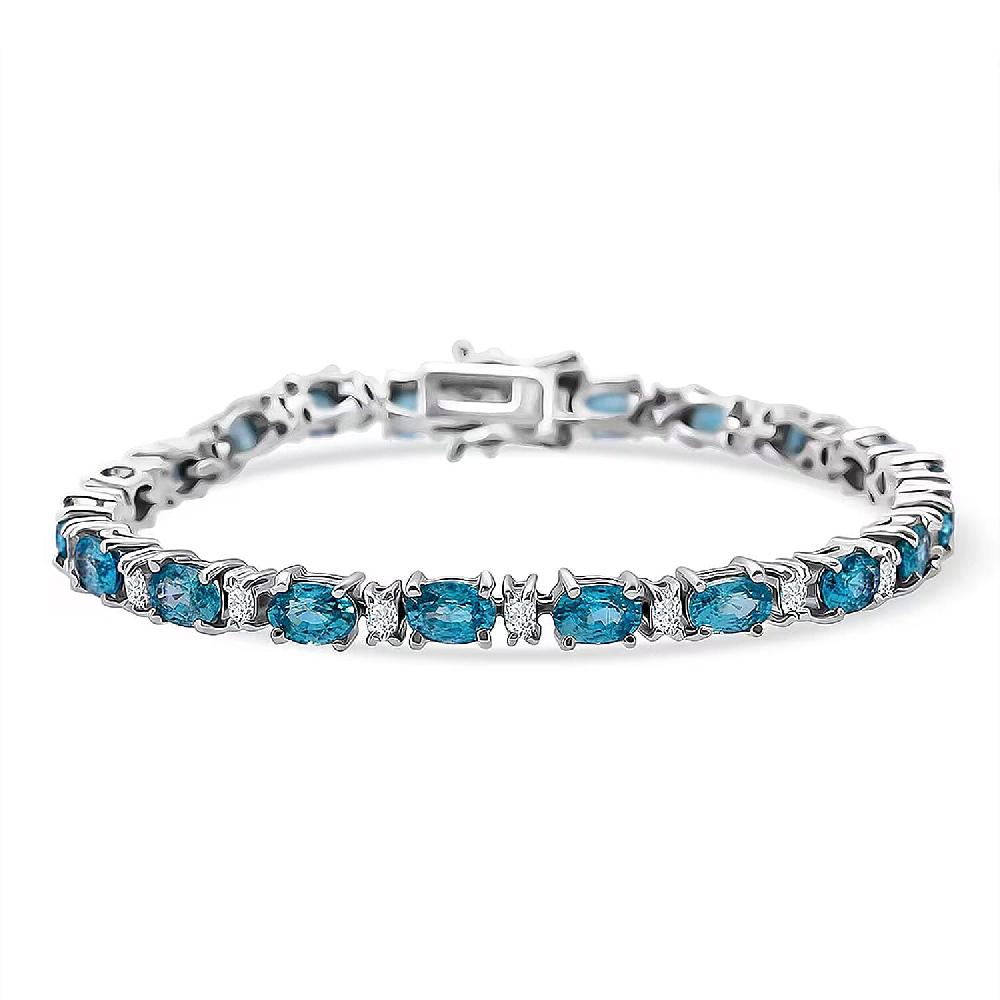 D'Joy Premium Cambodian Blue Zircon and Moissanite 19.10 ctw Ocean Glow Bracelet in Rhodium Over Sterling Silve (7.25 In) (Del. in 10-12 Days)