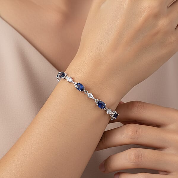 D'Joy Premium Catalina Iolite And White Zircon 5.60 Ctw Crown Legacy Bracelet In Rhodium Over Sterling Silver (6.50 In)