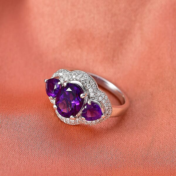 D'Joy Premium Lusaka Amethyst And Moissanite 3.00 Ctw Trilogy Ring In Rhodium Over Sterling Silver