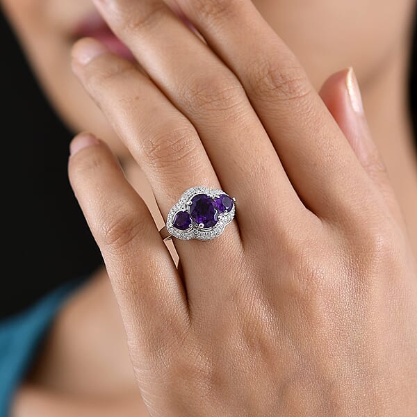 D'Joy Premium Lusaka Amethyst And Moissanite 3.00 Ctw Trilogy Ring In Rhodium Over Sterling Silver
