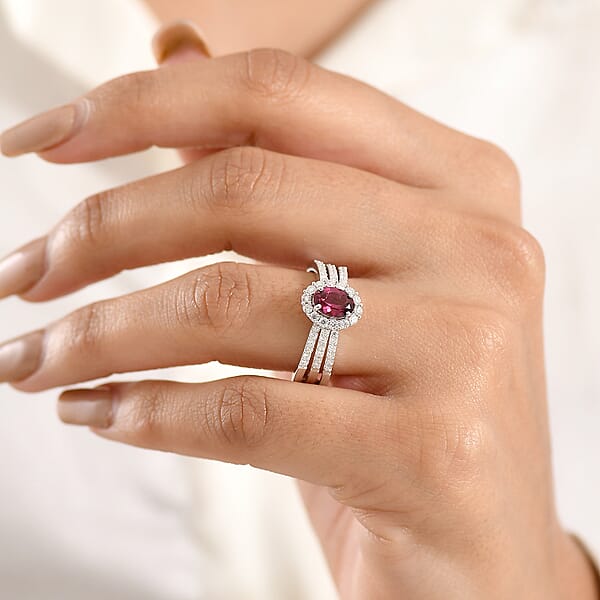 D'Joy Premium Malawi Magenta Garnet And Moissanite 1.60 Ctw Halo Crest Ring In Rhodium Over Sterling Silver