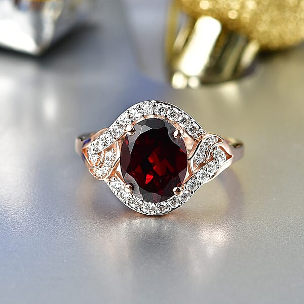 D'Joy Premium Mozambique Garnet And Moissanite 3.50 Ctw Flame Swirl Ring In 18K Vermeil Rose Gold Over Sterling Silver