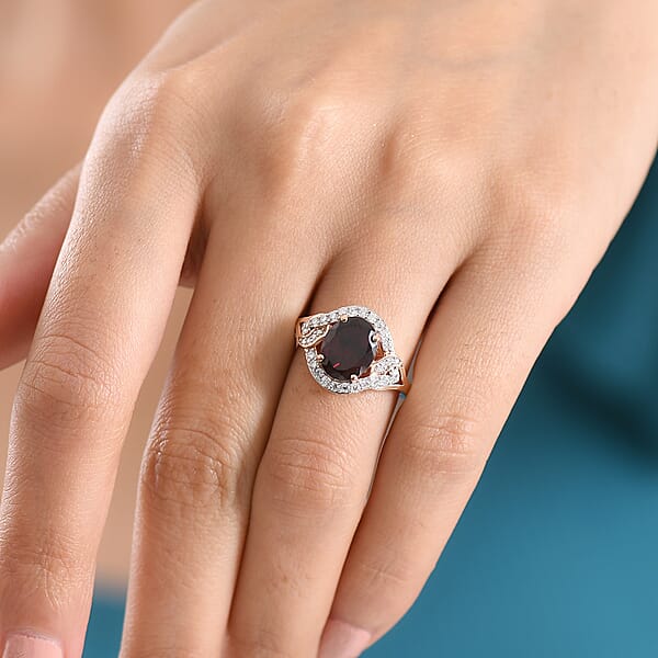 D'Joy Premium Mozambique Garnet And Moissanite 3.50 Ctw Flame Swirl Ring In 18K Vermeil Rose Gold Over Sterling Silver