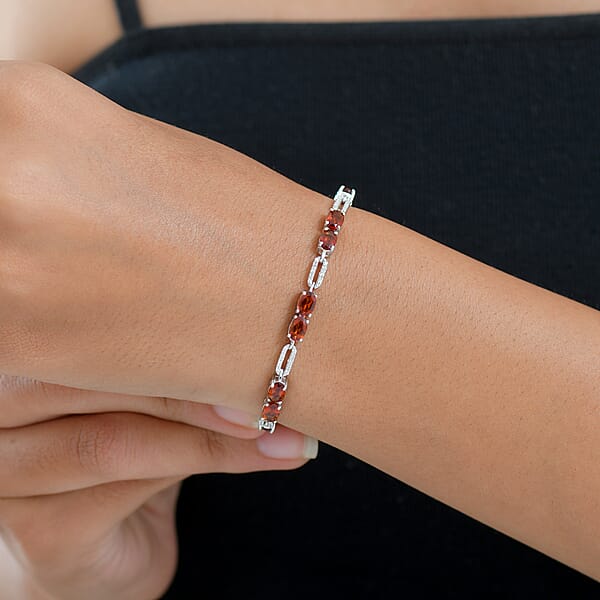 D'Joy Premium Red Citrine And Moissanite 6.10 Ctw Chain Of Flames Bracelet In Rhodium Over Sterling Silver (7.25 In)