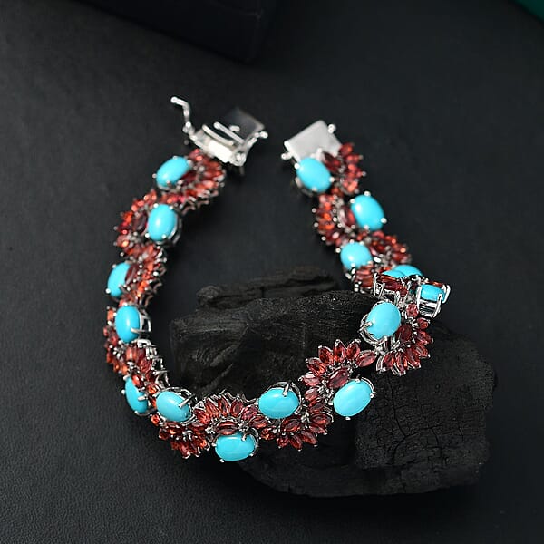 D'Joy Premium Sleeping Beauty Turquoise And Mozambique Garnet 28.60 Ctw Floral Symphony Bracelet In Rhodium Over Sterling Silver (7.25 In)