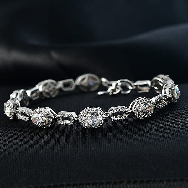 D'Joy Strontium Titanate And Moissanite 8.35 Ctw Oval Symphony Bracelet In Rhodium Over Sterling Silver (7.25 In)