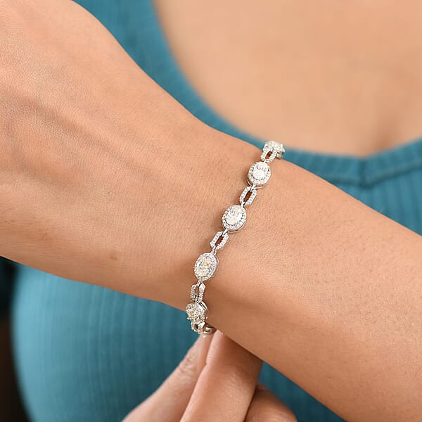 D'Joy Strontium Titanate And Moissanite 8.35 Ctw Oval Symphony Bracelet In Rhodium Over Sterling Silver (7.25 In)