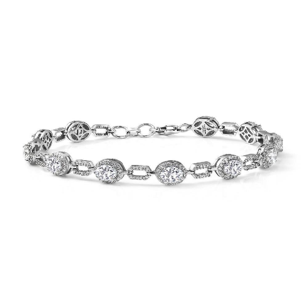 D'Joy Strontium Titanate and Moissanite 8.35 ctw Oval Symphony Bracelet in Rhodium Over Sterling Silver (7.25 In)