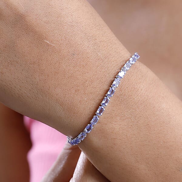 D'Joy Tanzanite 6.15 Ctw Tennis Bracelet In Rhodium Over Sterling Silver (7.25 In)