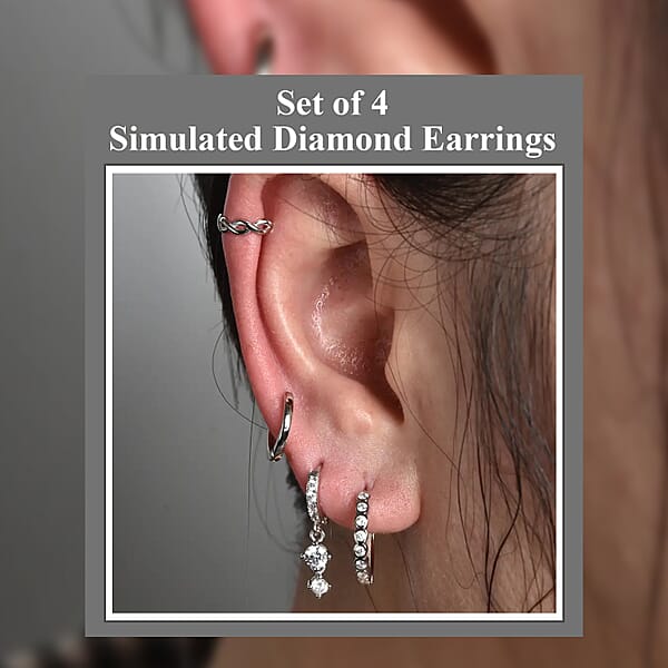 Ear Party Set Of 4 Simulated Diamond 1.30 Ctw Earrings 1 Hoops 1 Studded & 1 Plain Huggies 1 Criss-cross Ear Cuffs In Rhodium Over Sterling Silver