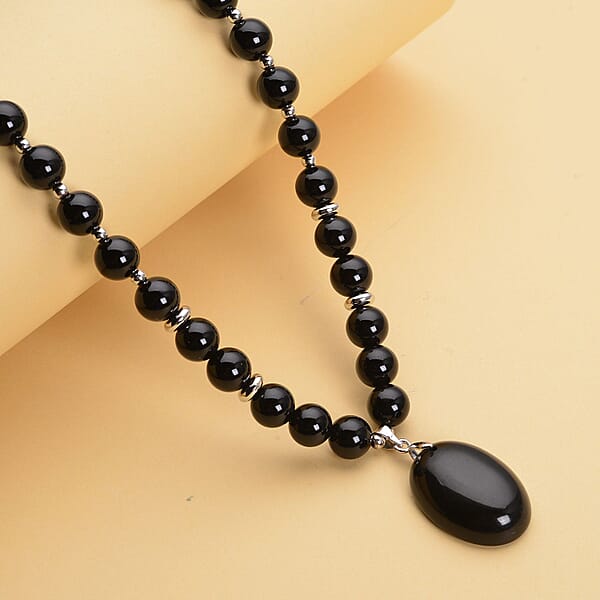 Enhanced Black Agate (D) 180.50 Ctw Beaded Necklace 18-20 Inches With Elongated Matching Pendant In Silvertone