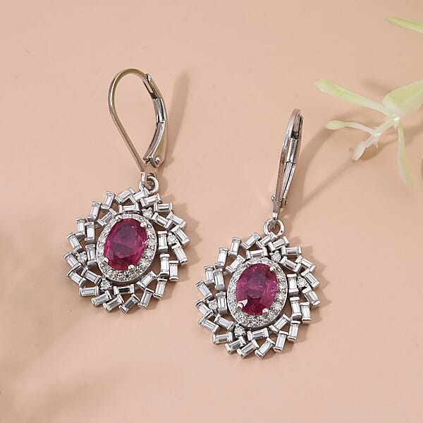 Niassa Ruby (FF) And Moissanite 4.00 Ctw Earrings In Rhodium Over Sterling Silver