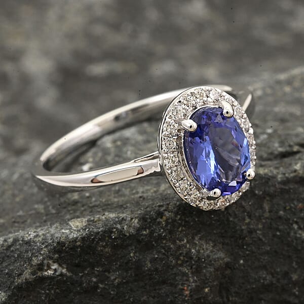 One Of A Kind Certified & Appraised Iliana 18K White Gold AAA Tanzanite And G-H SI Diamond Halo Ring 1.00 Ctw