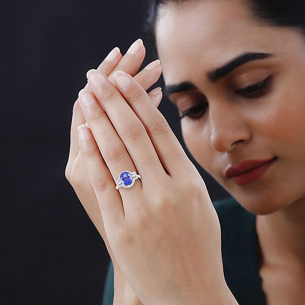 One Of A Kind Certified & Appraised Rhapsody AAAA Tanzanite And E-F VS Diamond 5.30 Ctw Halo Ring In 950 Platinum 6 Grams