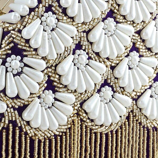Purple Hand Embroidery Pearl Studded Velvet Clutch With Tassels Ring Handle And Sling Chain