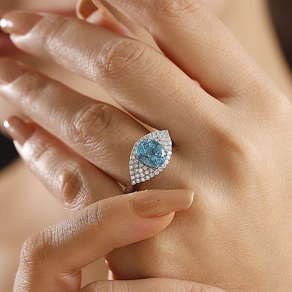 Rhapsody 950 Platinum AAAA Ratanakiri Blue Zircon Diamond (E-F VS) (0.51 Cts) Ring (6.80 G) 4.75 Ctw
