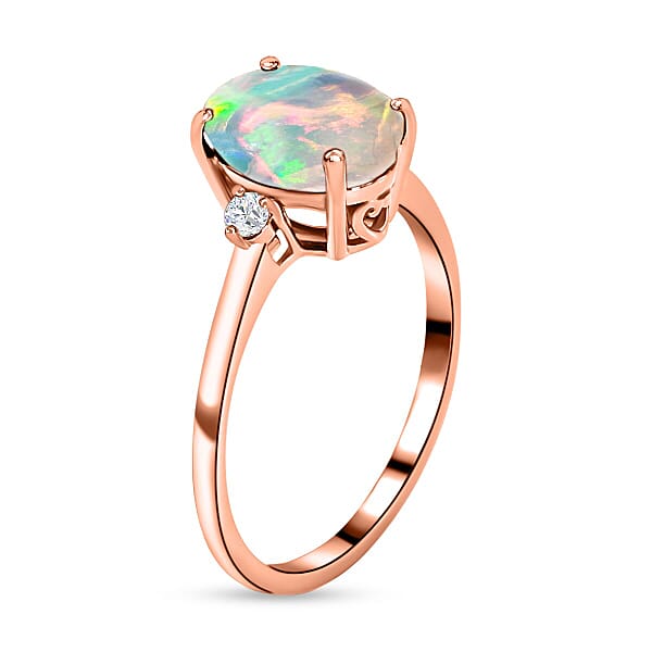 Rhapsody AAAA Ethiopian Welo Opal And E-F VS2 Diamond Ring In 18K Rose Gold 1.30 Ctw (Del. In 10-12 Days)