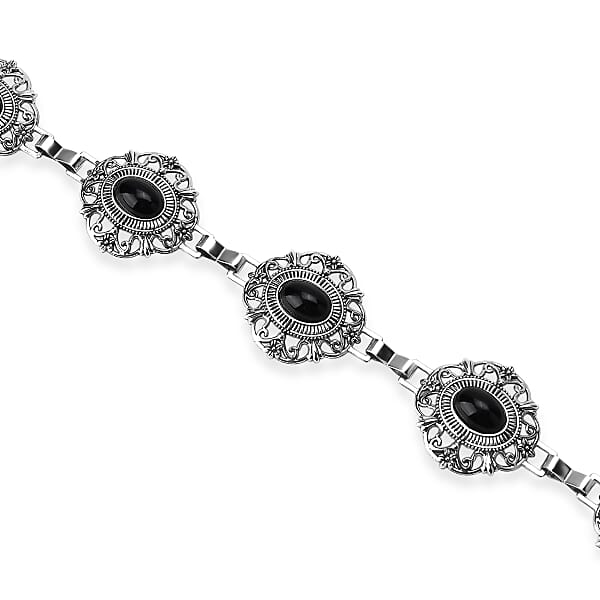 Tamsy Silvertone Floral Design Concho Belt