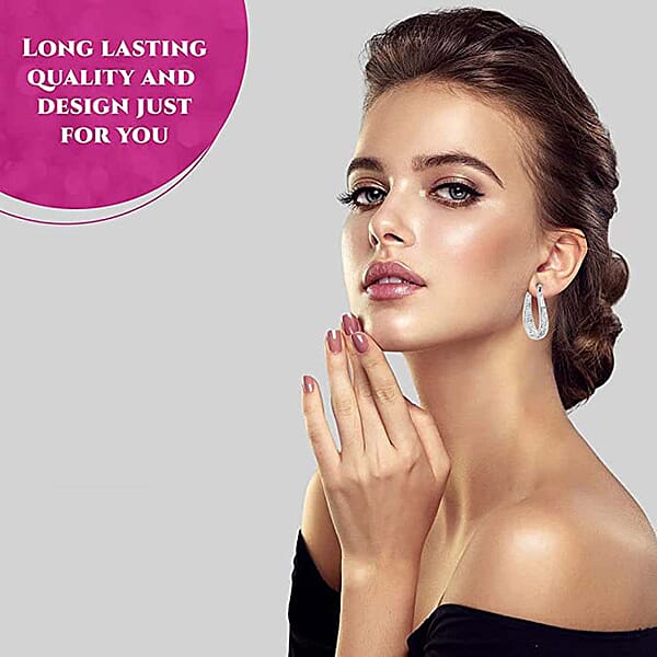 White Austrian Crystal Inside Out Hoop Earrings In Silvertone